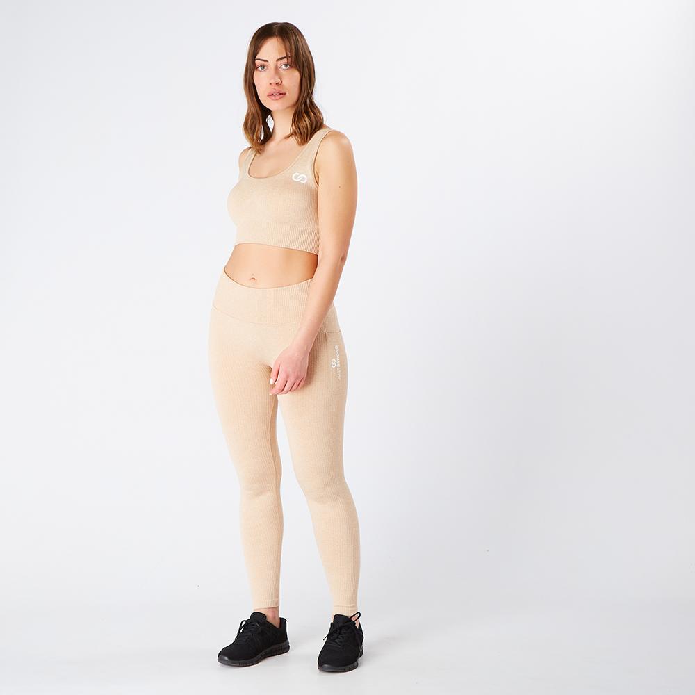 nude-ribbed-seamless-pocket-leggings-model-front