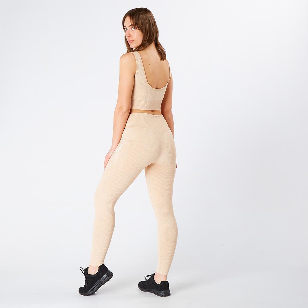 nude-ribbed-seamless-pocket-leggings-model-side